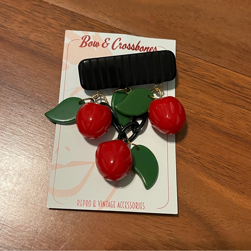 Bow & Crossbones apple brooch pinup